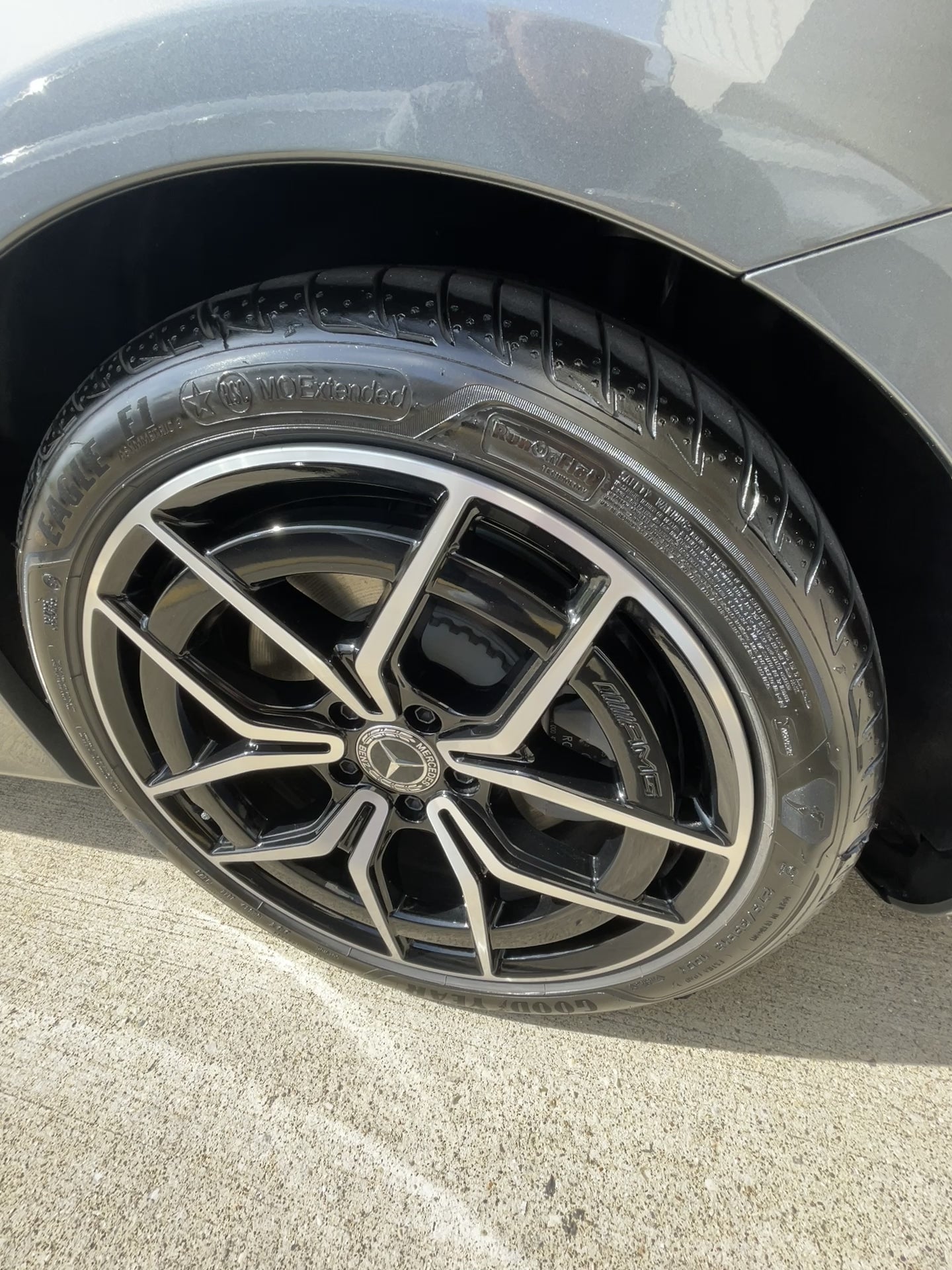 Video of Mercedes-Benz alloy wheel with clean tire on white vehicle